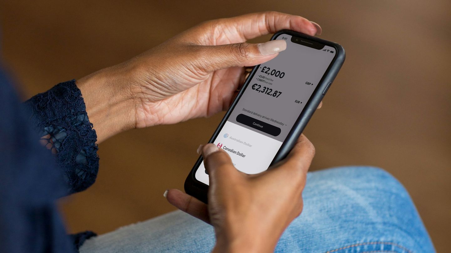 A person using a mobile money-transfer application.